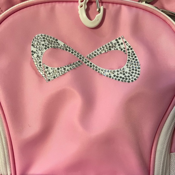 LIGHT PINK NFINITY BACKPACK AS IS - Picture 3 of 11